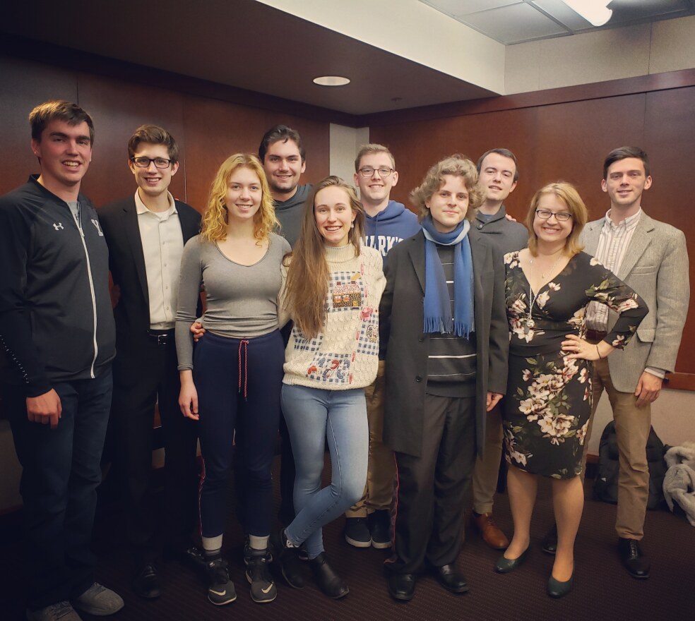Members of the Yale Russian Chorus at WXXI studios with Classical 91.5 morning host Brenda Tremblay